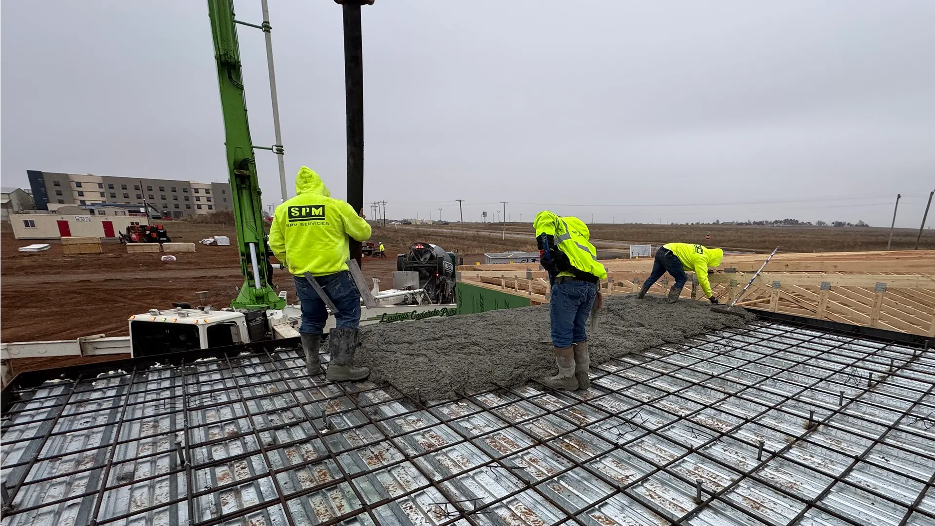 SPM Services concrete crew coordinating work on an Oklahoma jobsite